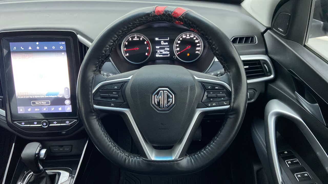 Interior dashboard and steering wheel of a MG Hector