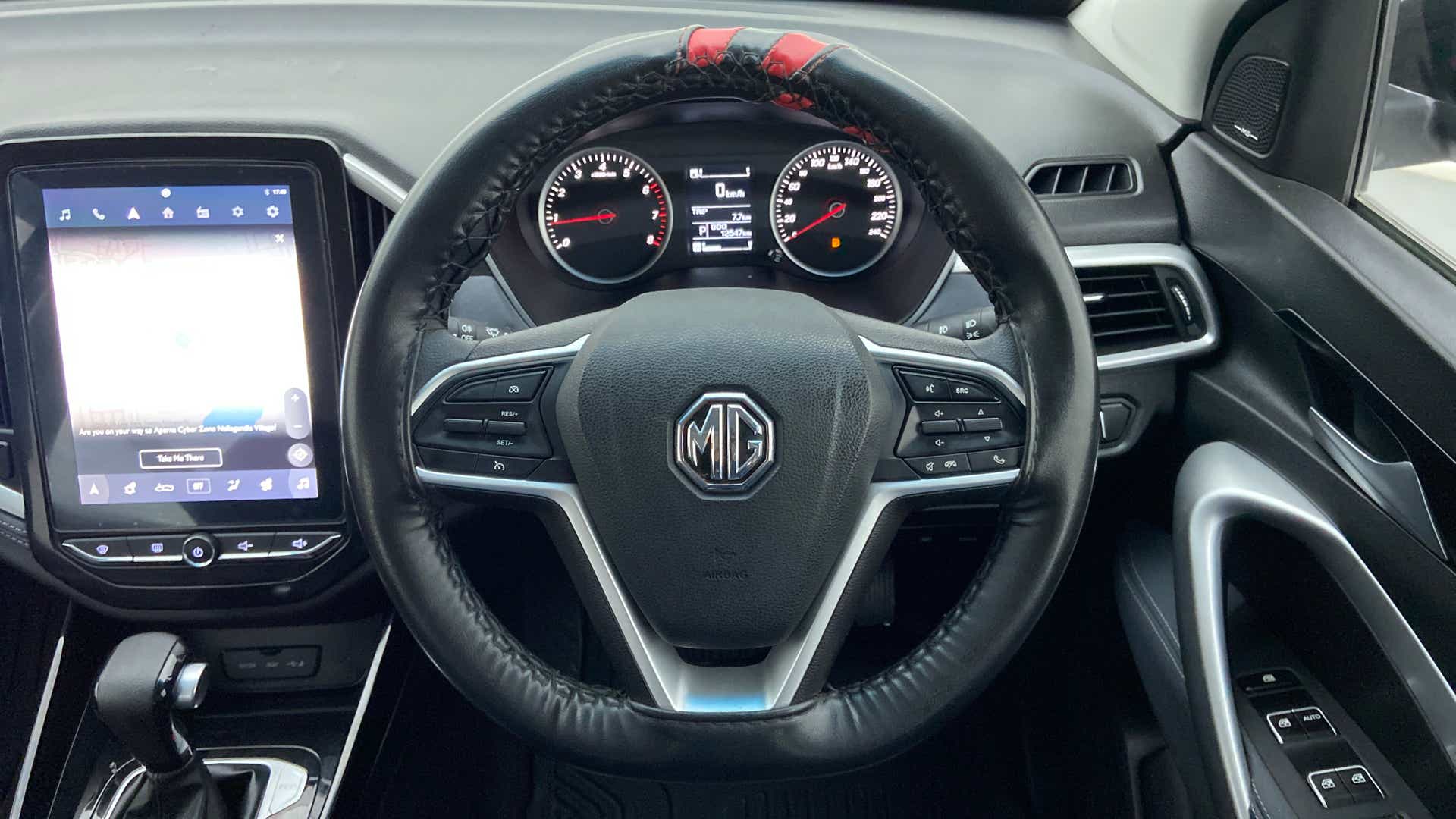 Interior dashboard and steering wheel of a MG Hector