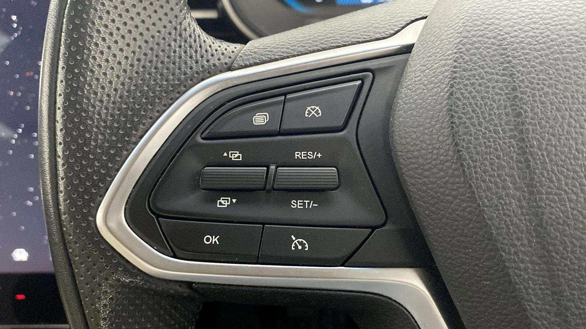 Steering wheel control buttons of a MG Hector