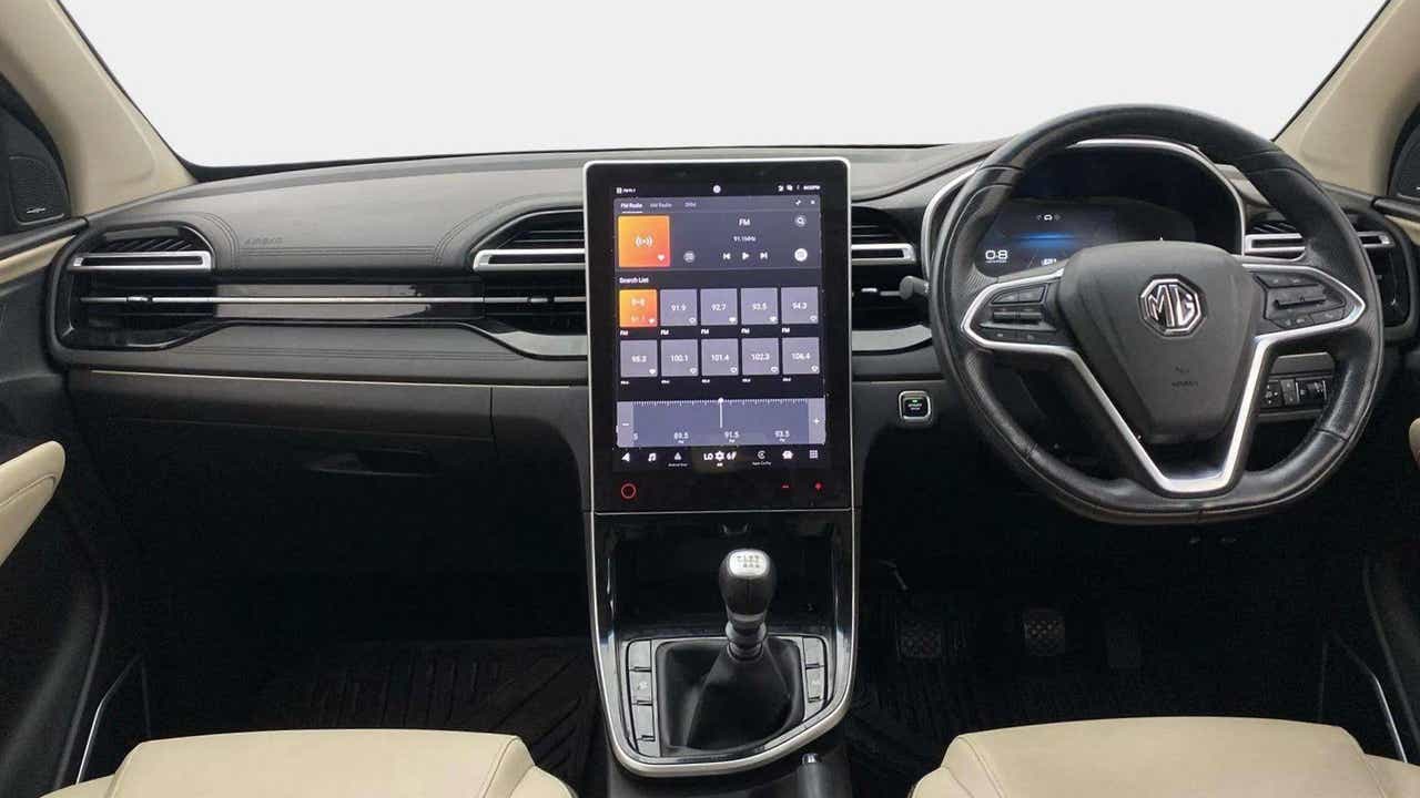 Dashboard and steering wheel view of a MG Hector