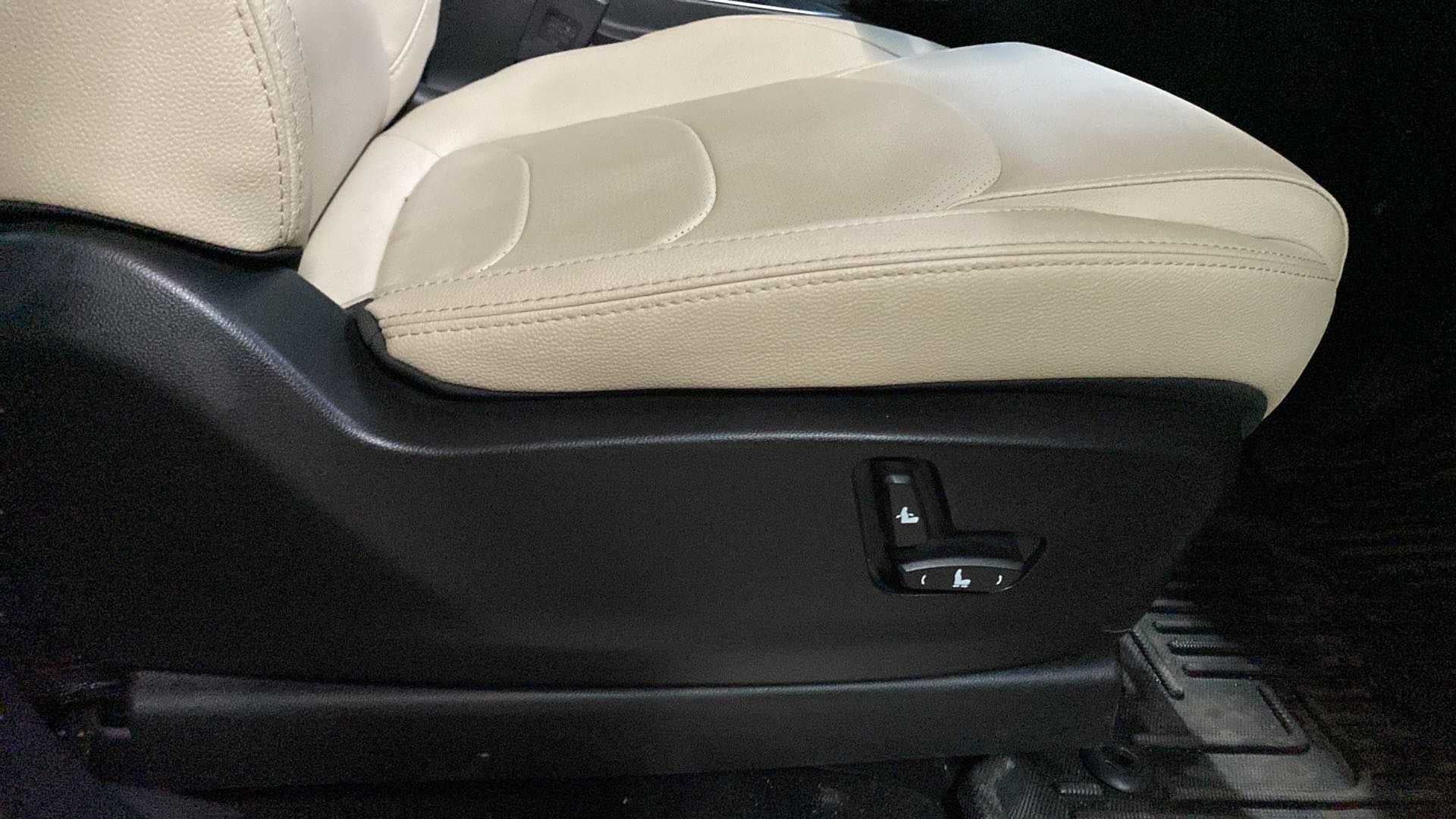 Front seat adjustment controls of a MG Hector