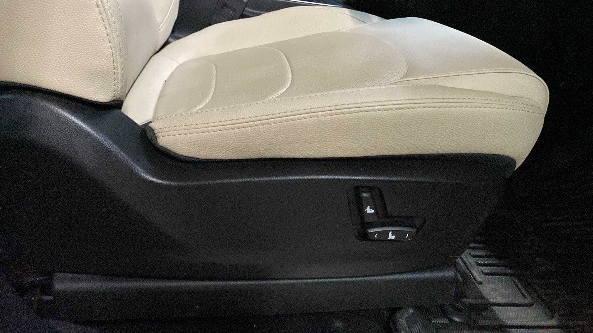 Front seat adjustment controls of a MG Hector
