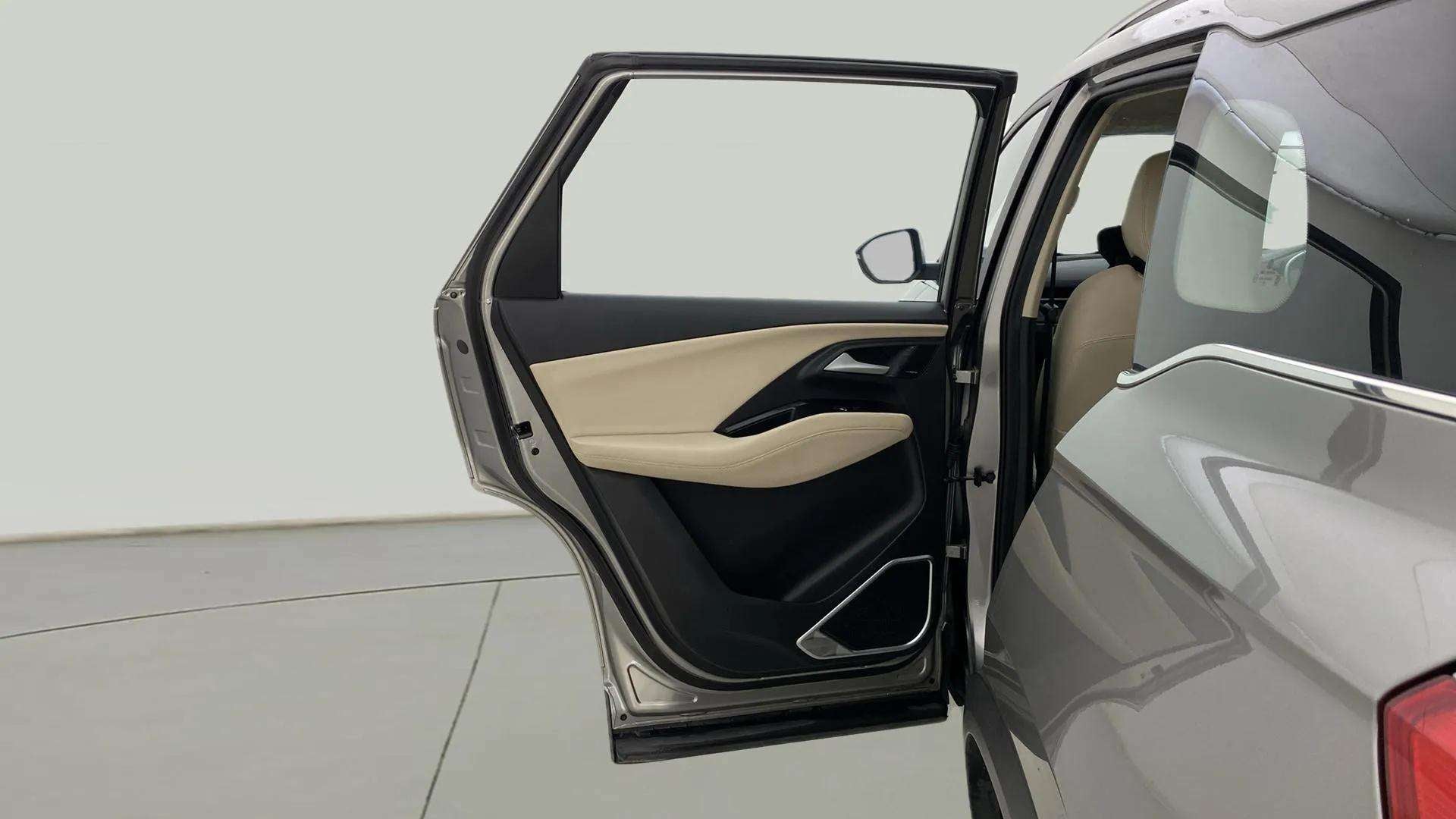 Rear door and partial interior of a MG Hector