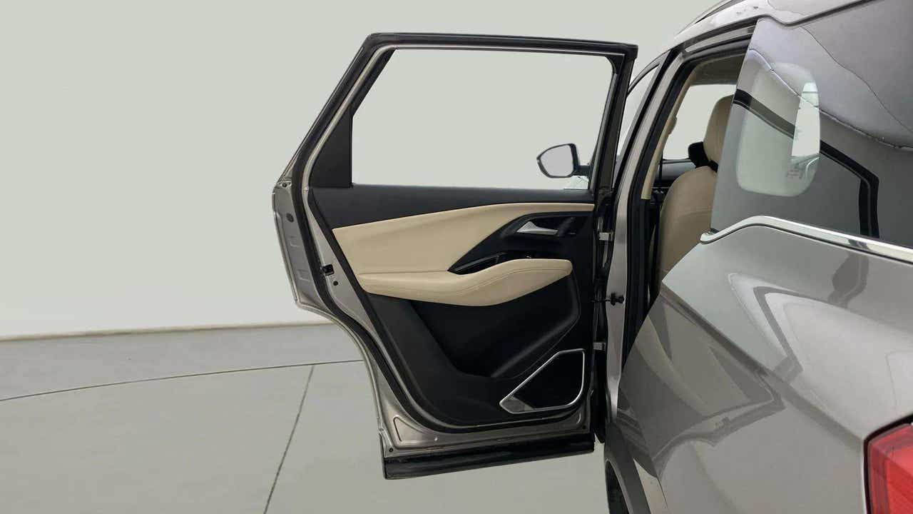 Rear door and partial interior of a MG Hector