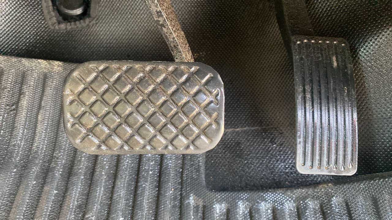 Close-up of car brake and accelerator pedals of a MG Hector