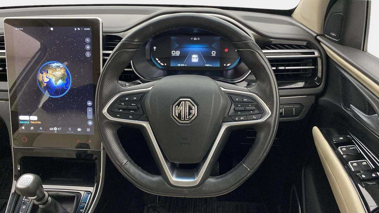 Interior dashboard and steering wheel of a MG Hector