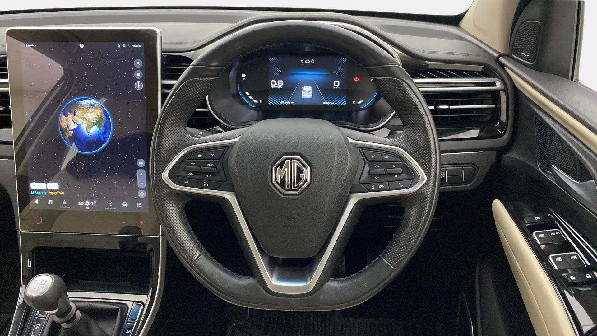 Interior dashboard and steering wheel of a MG Hector