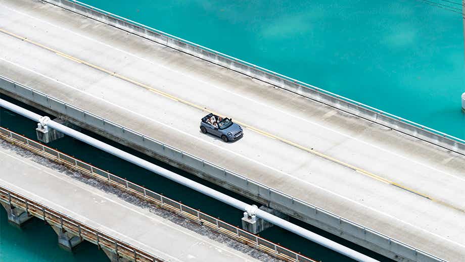 Overhead view of a Mini Cooper S Convertible on a bridge