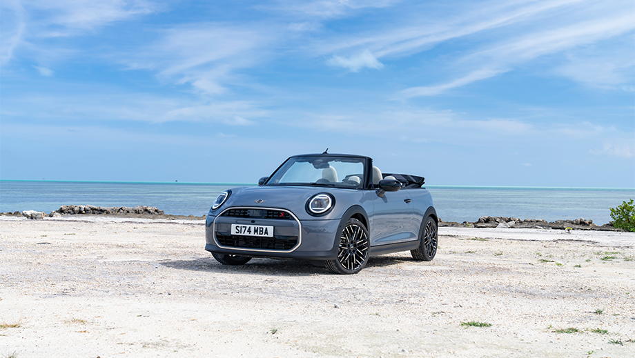 Front three quarter of a Mini Cooper S Convertible on a beach