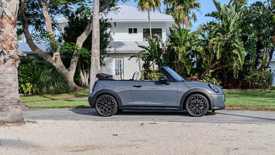 Side view of a Mini Cooper S Convertible with the top down