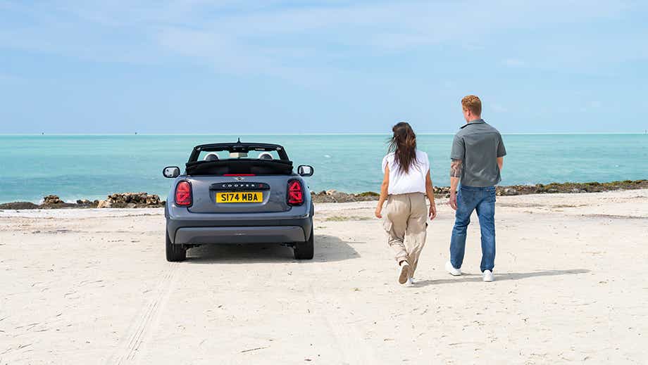 Rear view of a Mini Cooper S Convertible on beachside