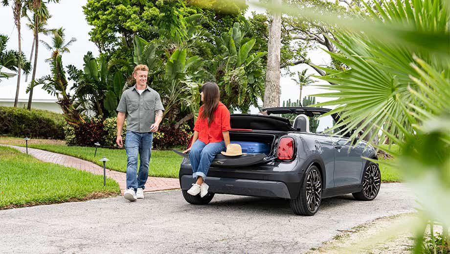 Rear view of a Mini Cooper S Convertible with open trunk