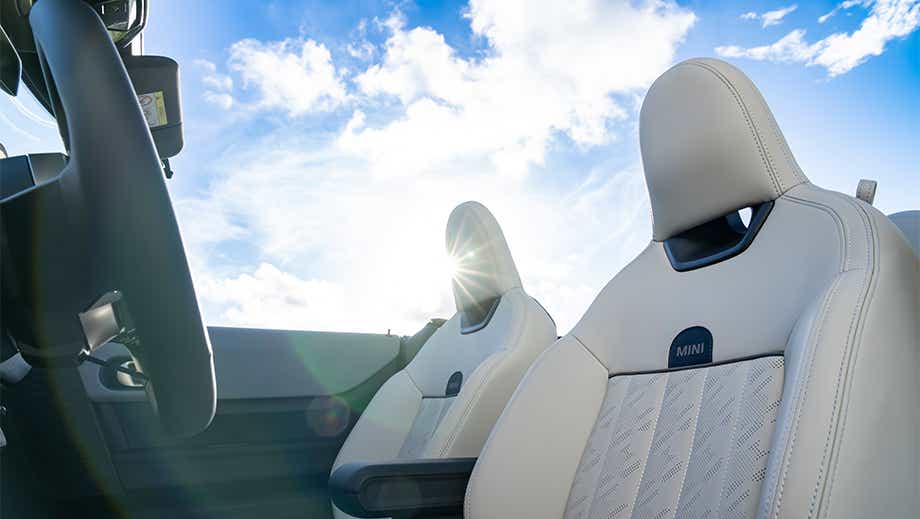 Close-up of front seats and dashboard of a Mini Cooper S Convertible