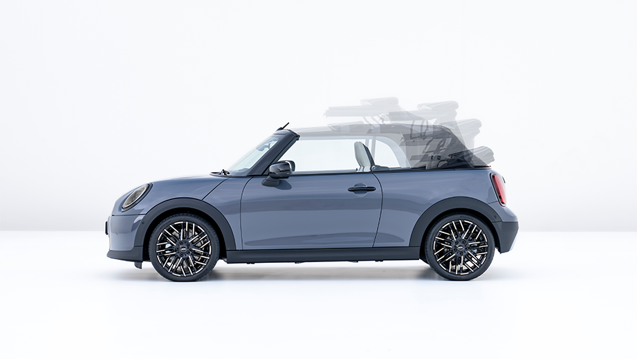 Side view of a Mini Cooper S Convertible with the roof opening