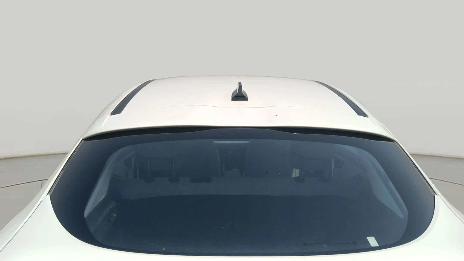 Roof and rear window of a Pristine White Tata Curvv