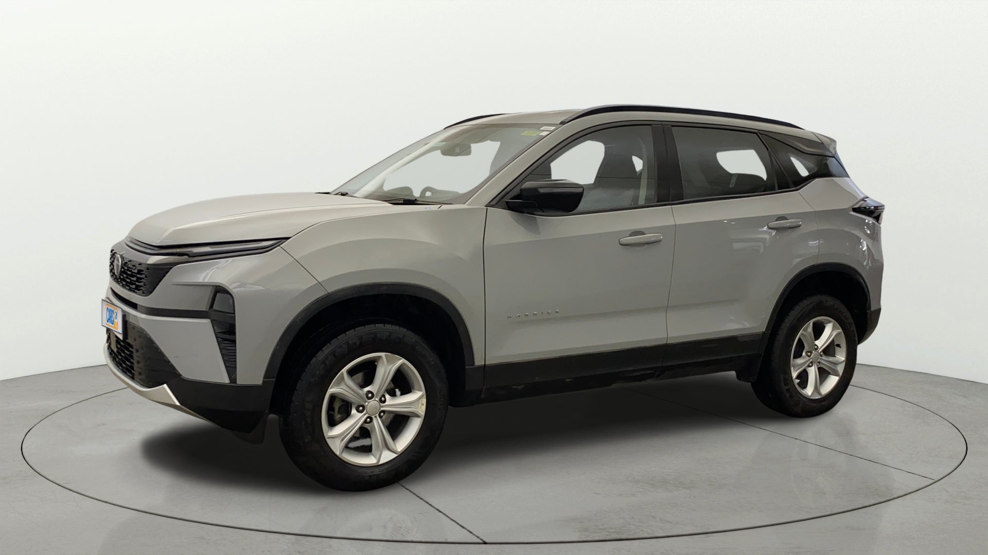Front side view of a Pebble Grey Tata Harrier
