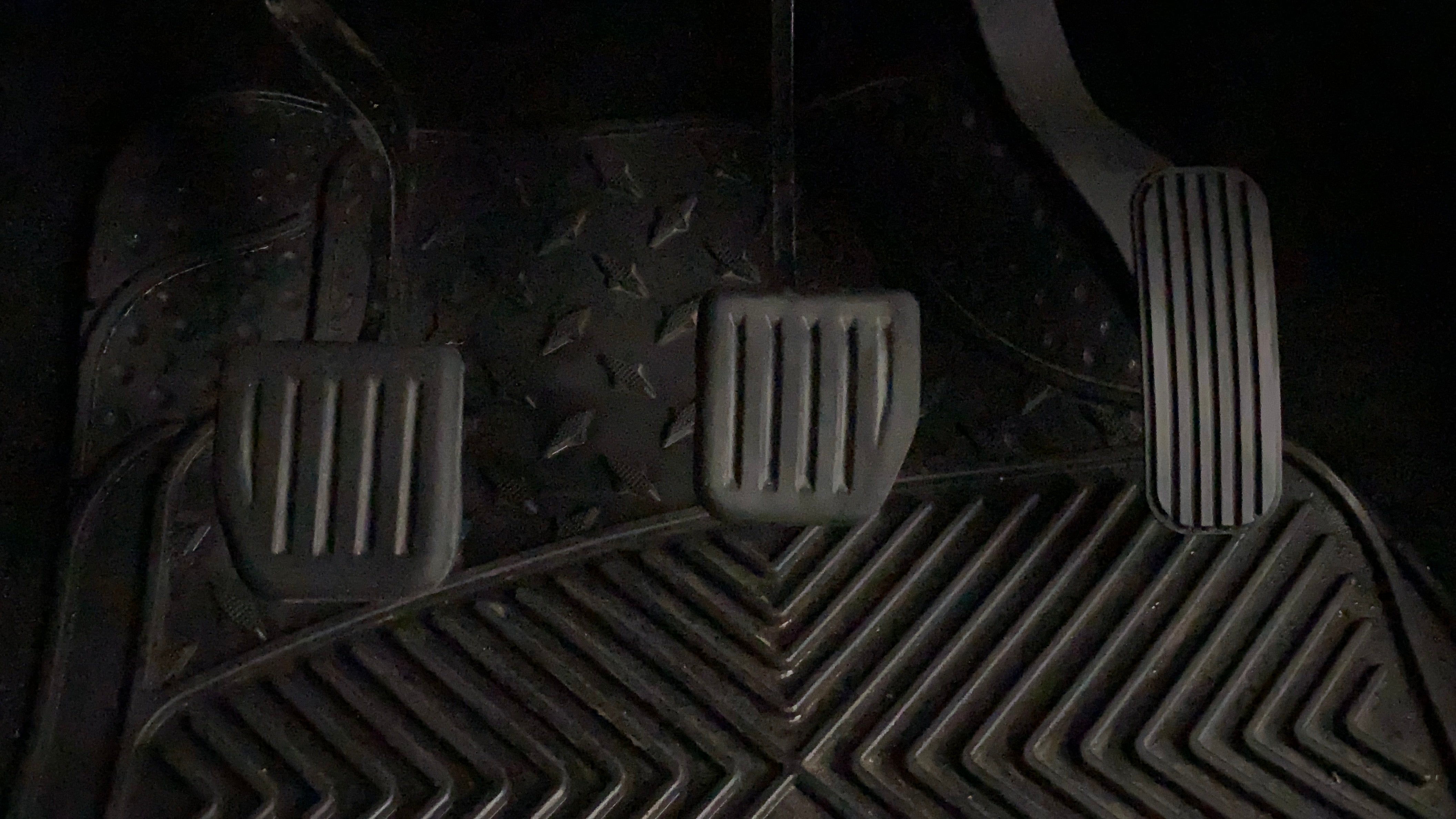 Close-up of car pedals in a Tata Harrier