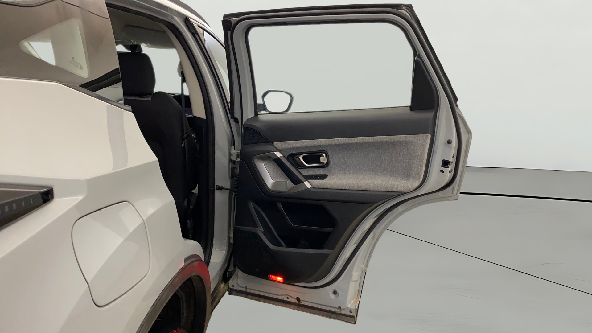 Rear door open view of a Tata Harrier