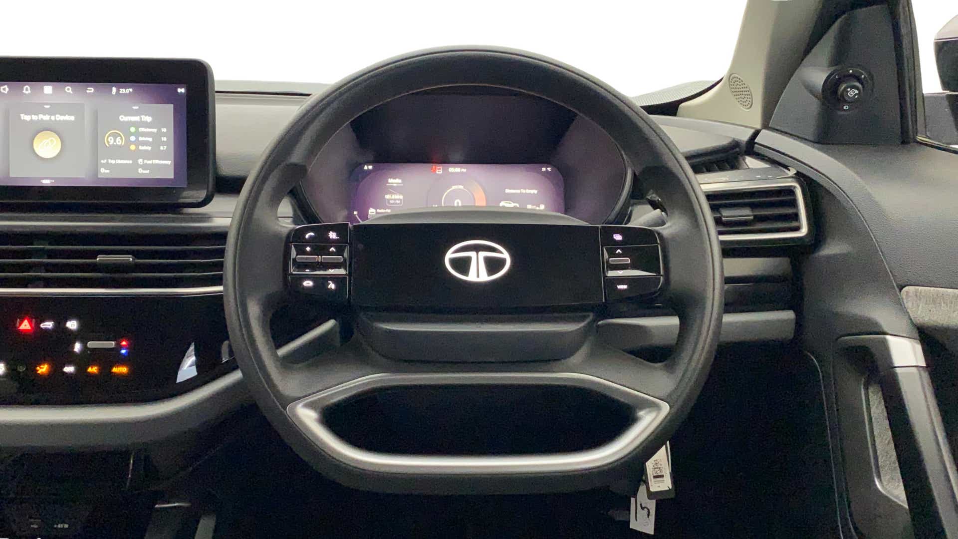 Interior dashboard and steering wheel of a Tata Harrier