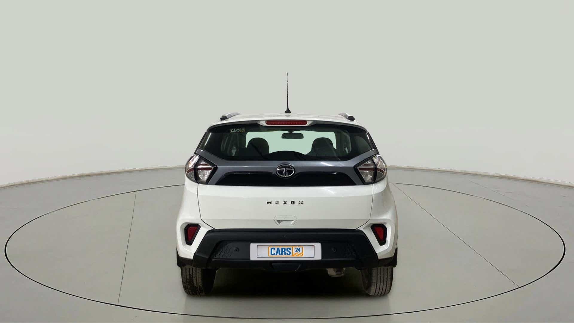 Rear view of a calgary white Tata Nexon 2017-2023