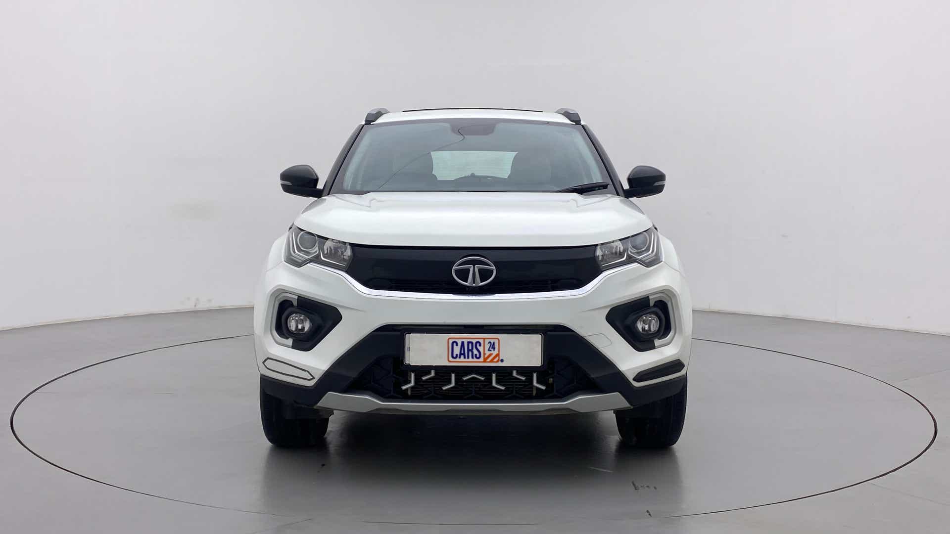 Front view of a Calgary White Tata Nexon 2017-2023