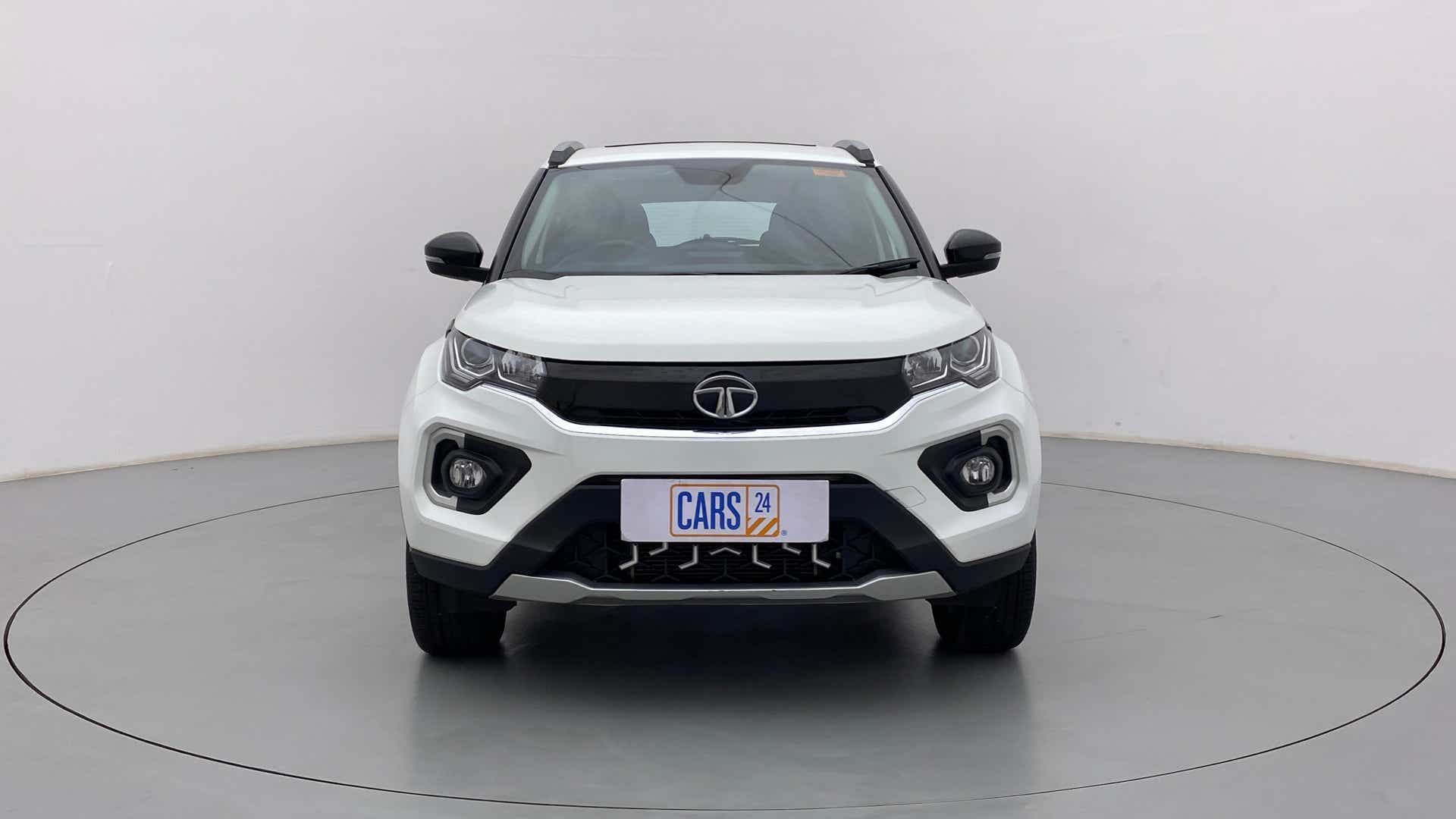 Front view of a Calgary White Tata Nexon 2017-2023