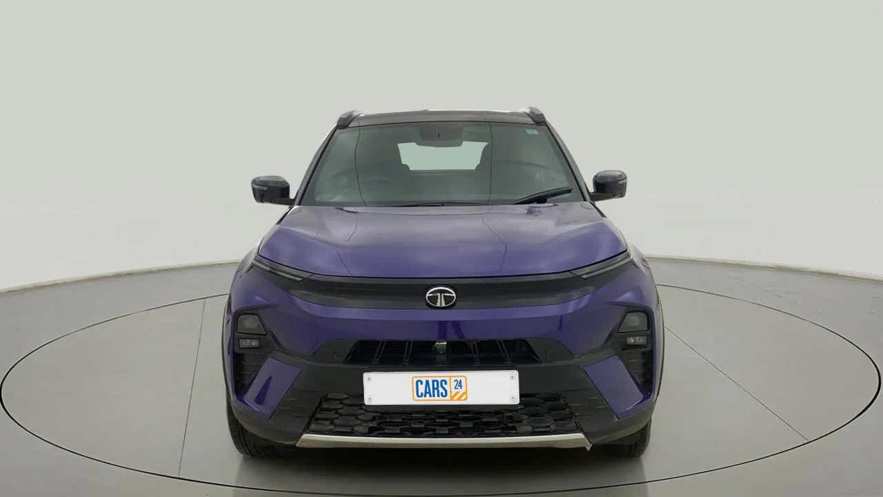 Front view of a Royal Blue Tata Nexon