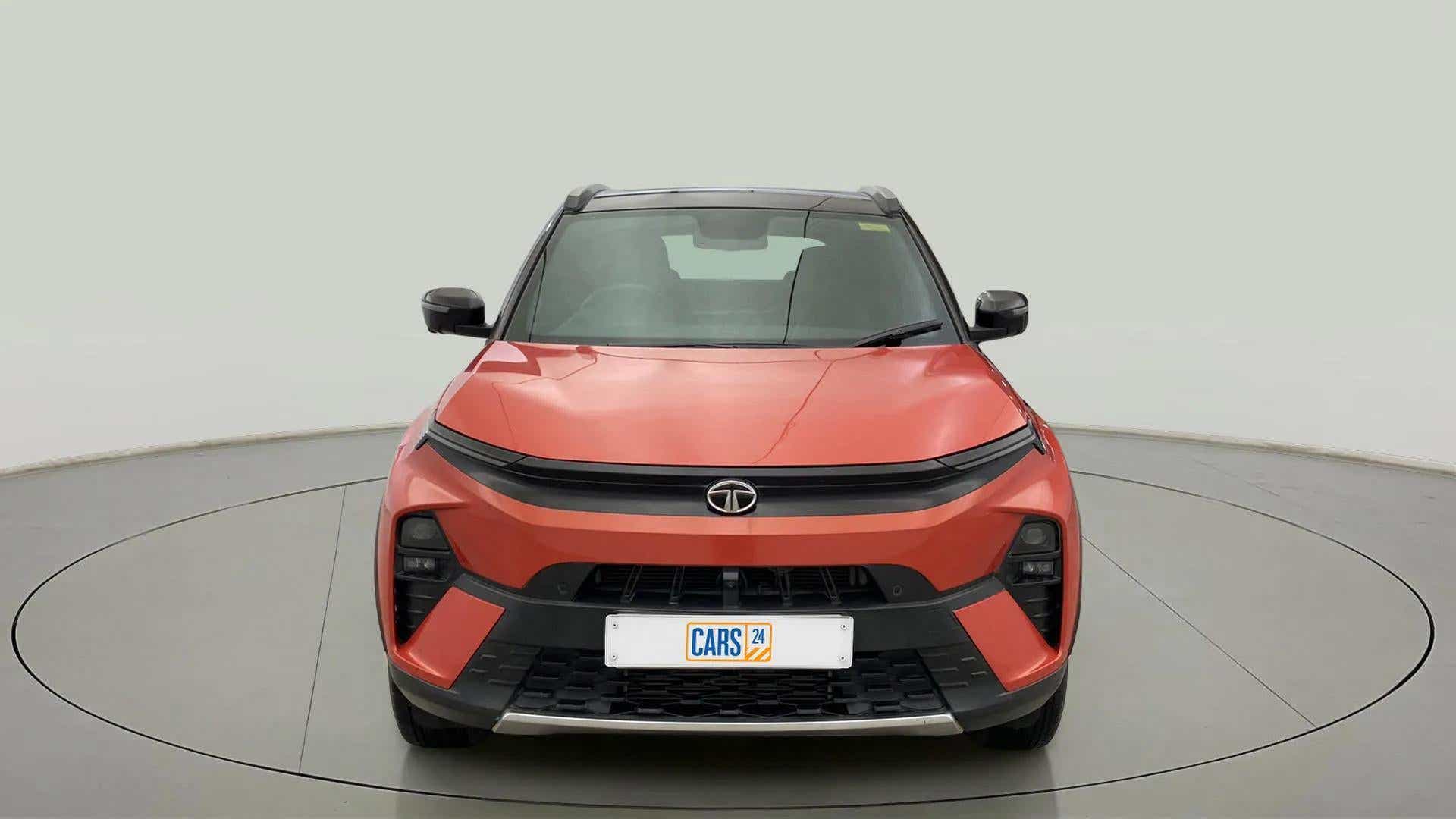 Front view of a Flame Red Tata Nexon 2017-2023