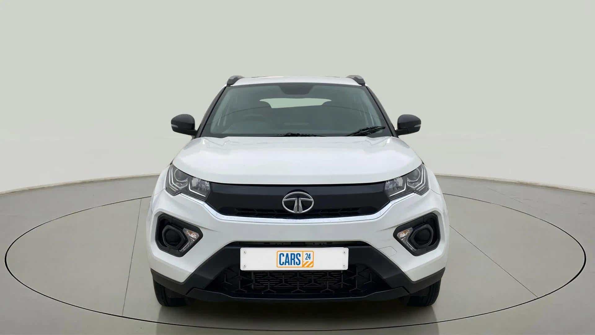 Front view of a calgary white Tata Nexon 2017-2023