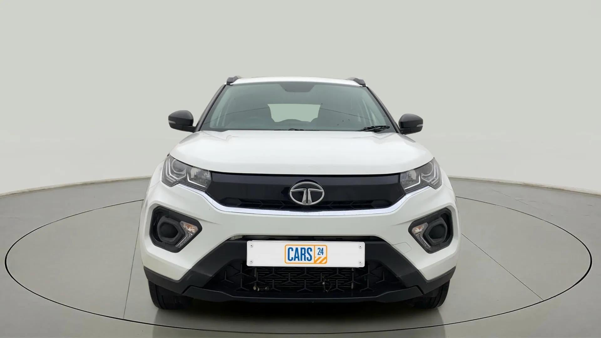 Front view of a Calgary White Tata Nexon 2017-2023