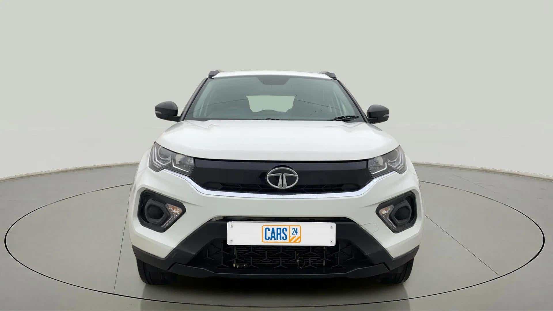 Front view of a Calgary White Tata Nexon 2017-2023