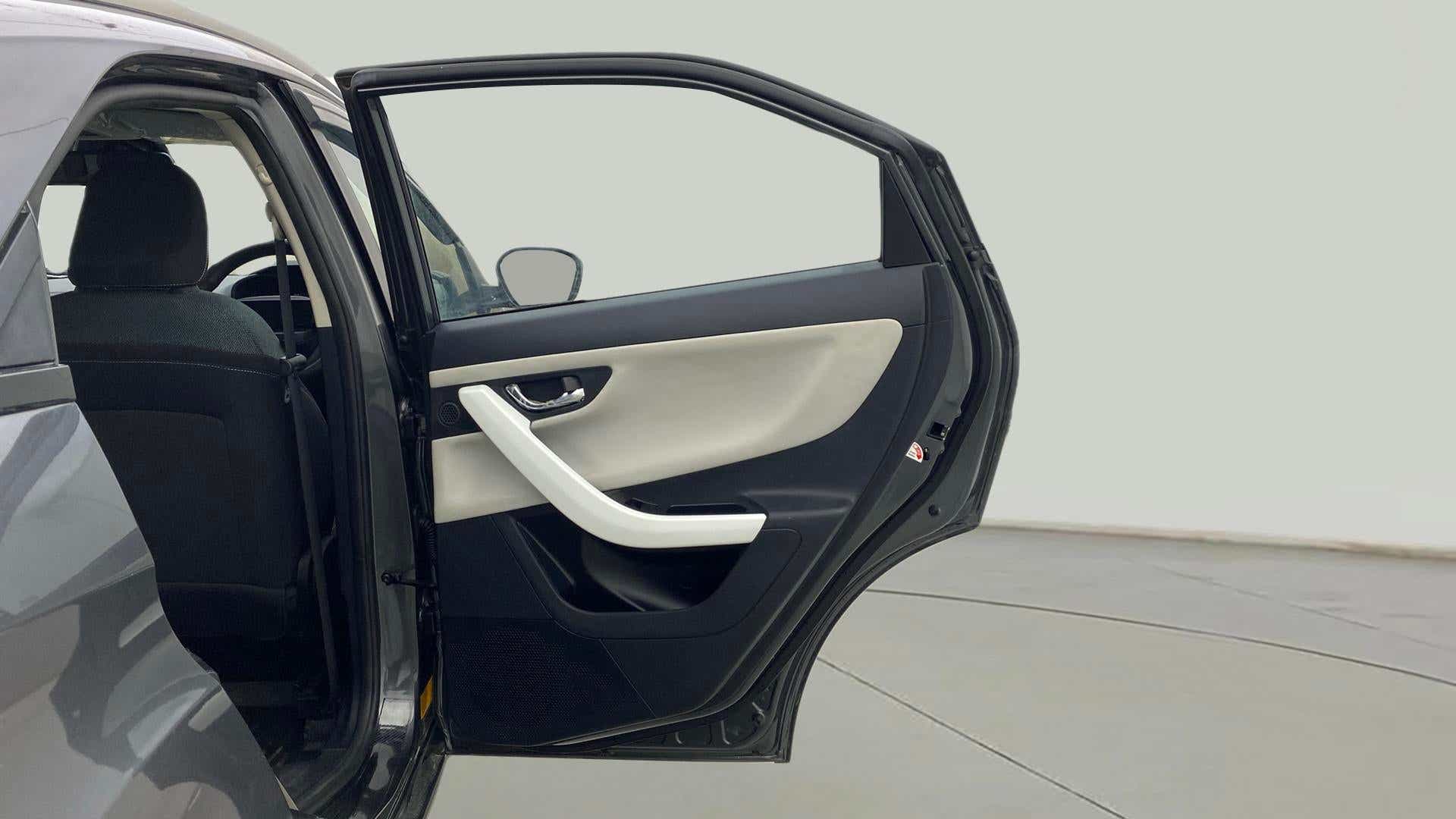 Rear door open view of a Tata Nexon