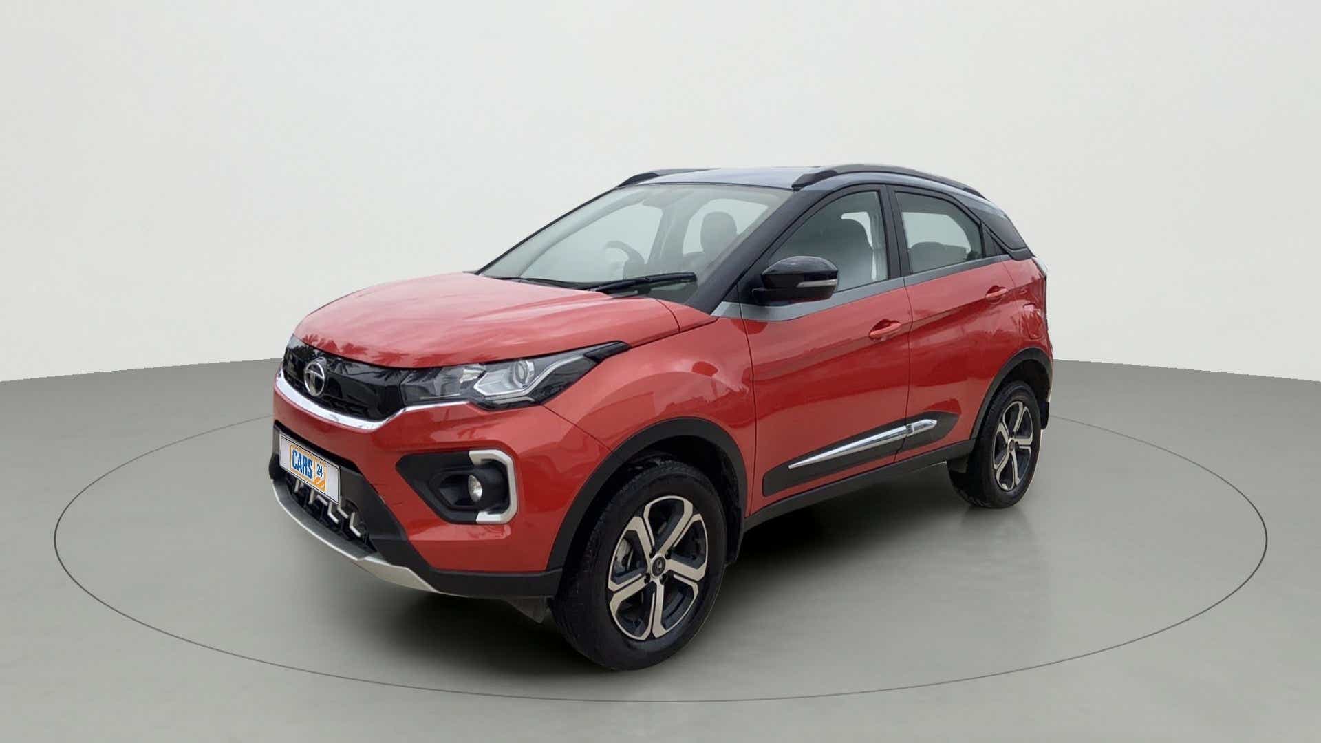 Front three-quarter view of a Flame Red Tata Nexon 2017-2023