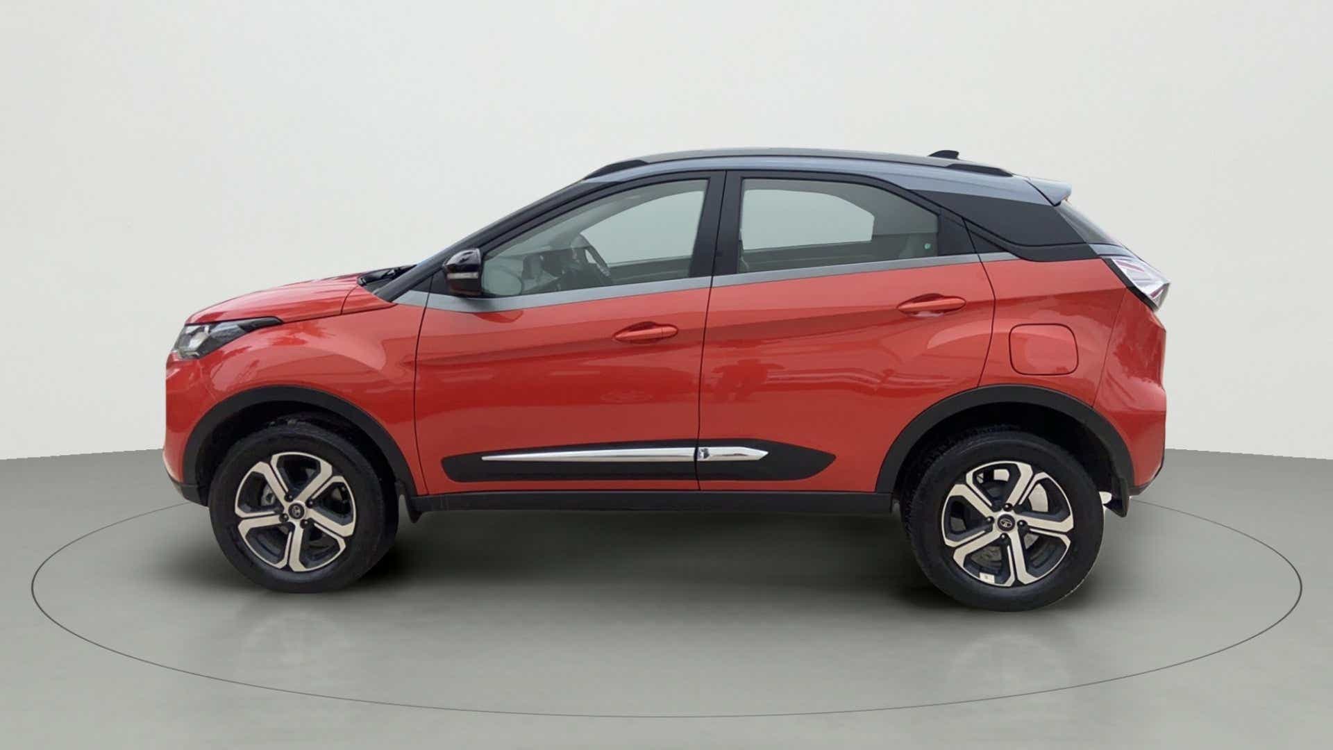 Side view of a Flame Red Tata Nexon 2017-2023