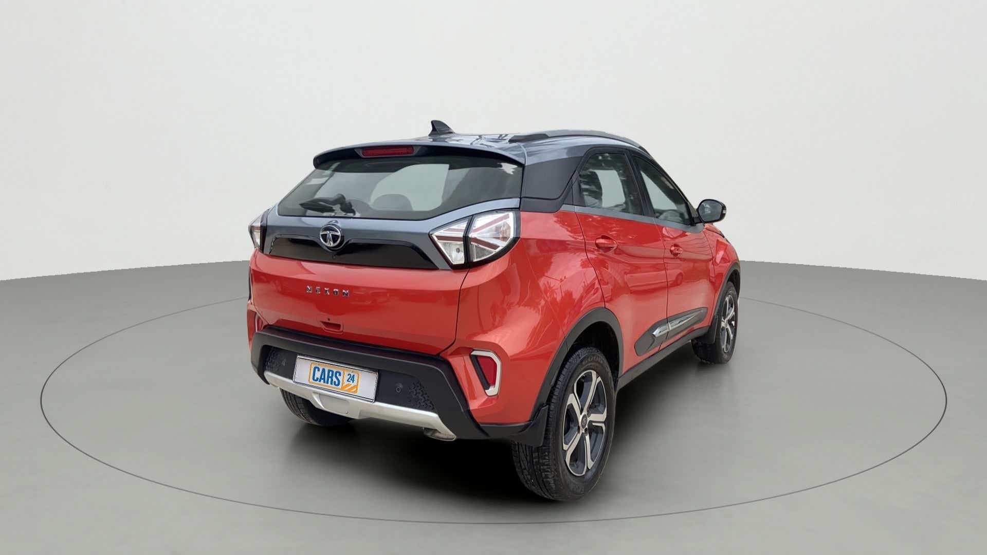 Rear three-quarter view of a Flame Red Tata Nexon 2017-2023