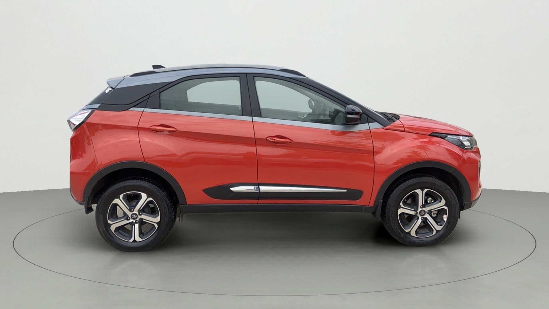 Side view of a Flame Red Tata Nexon 2017-2023
