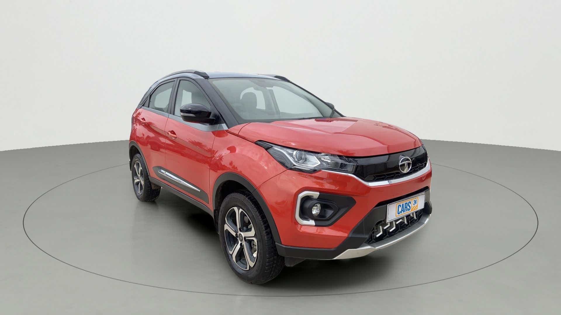 Front three-quarter view of a Flame Red Tata Nexon 2017-2023