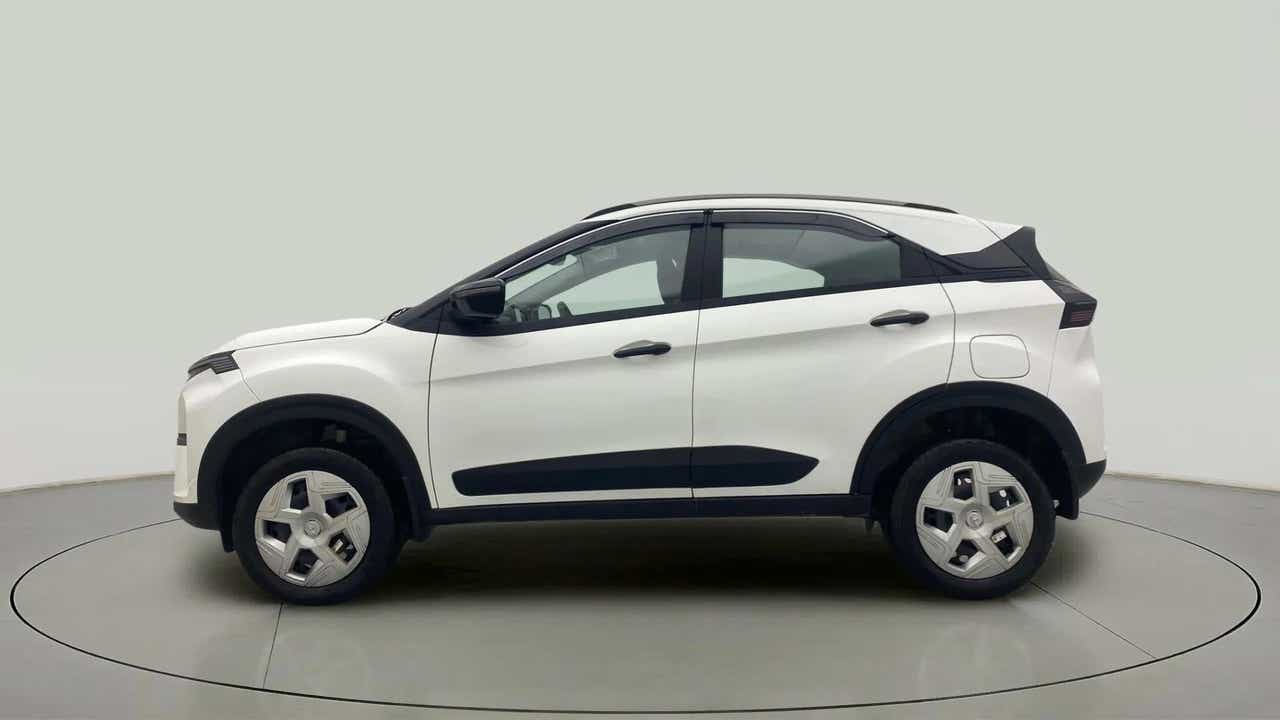 Side view of a Calgary White Tata Nexon 2017-2023