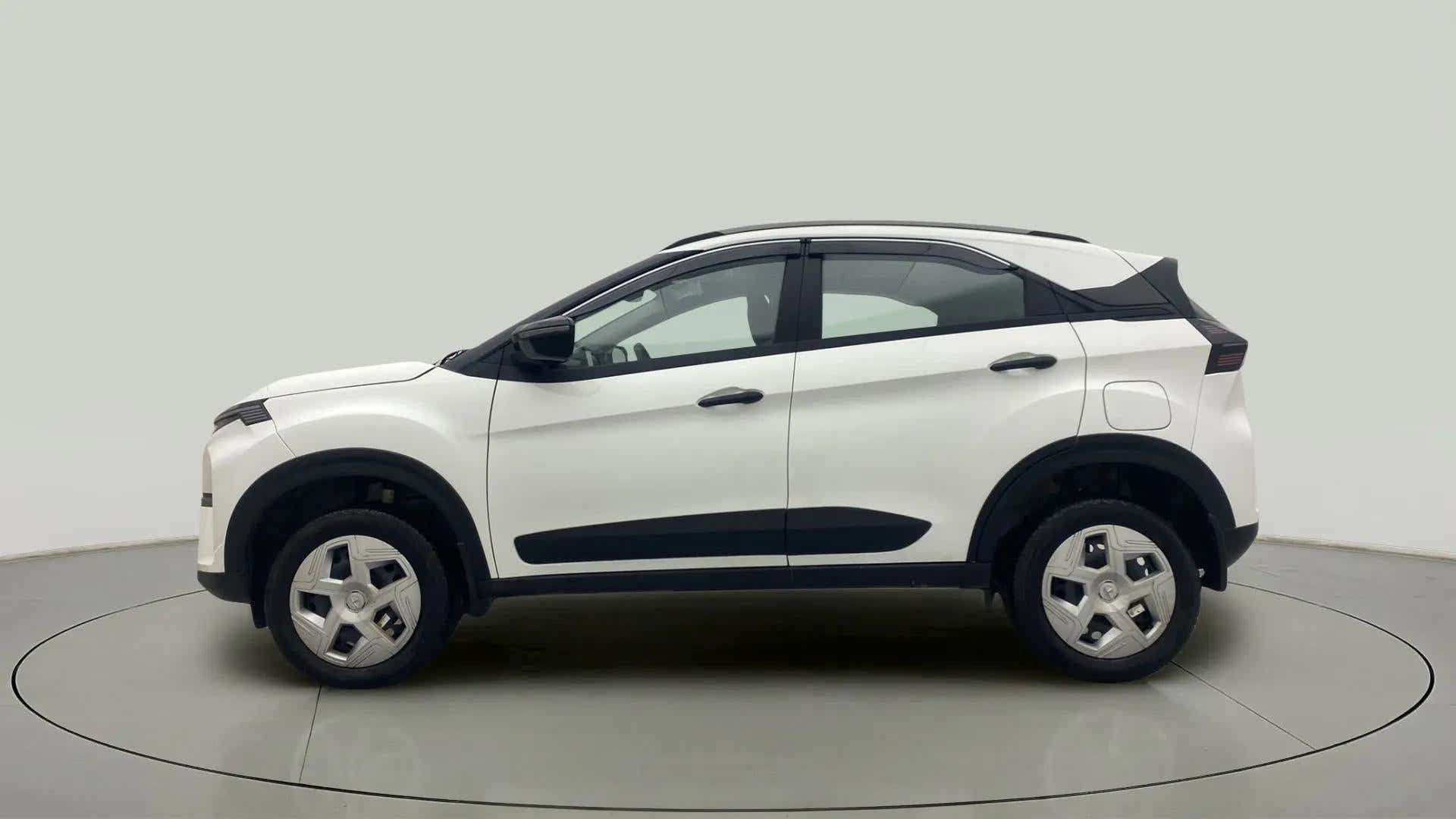 Side view of a Calgary White Tata Nexon 2017-2023