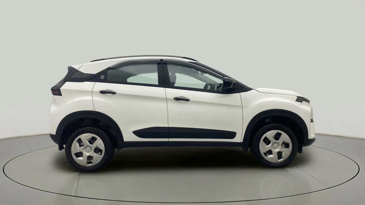 Side view of a Calgary White Tata Nexon 2017-2023