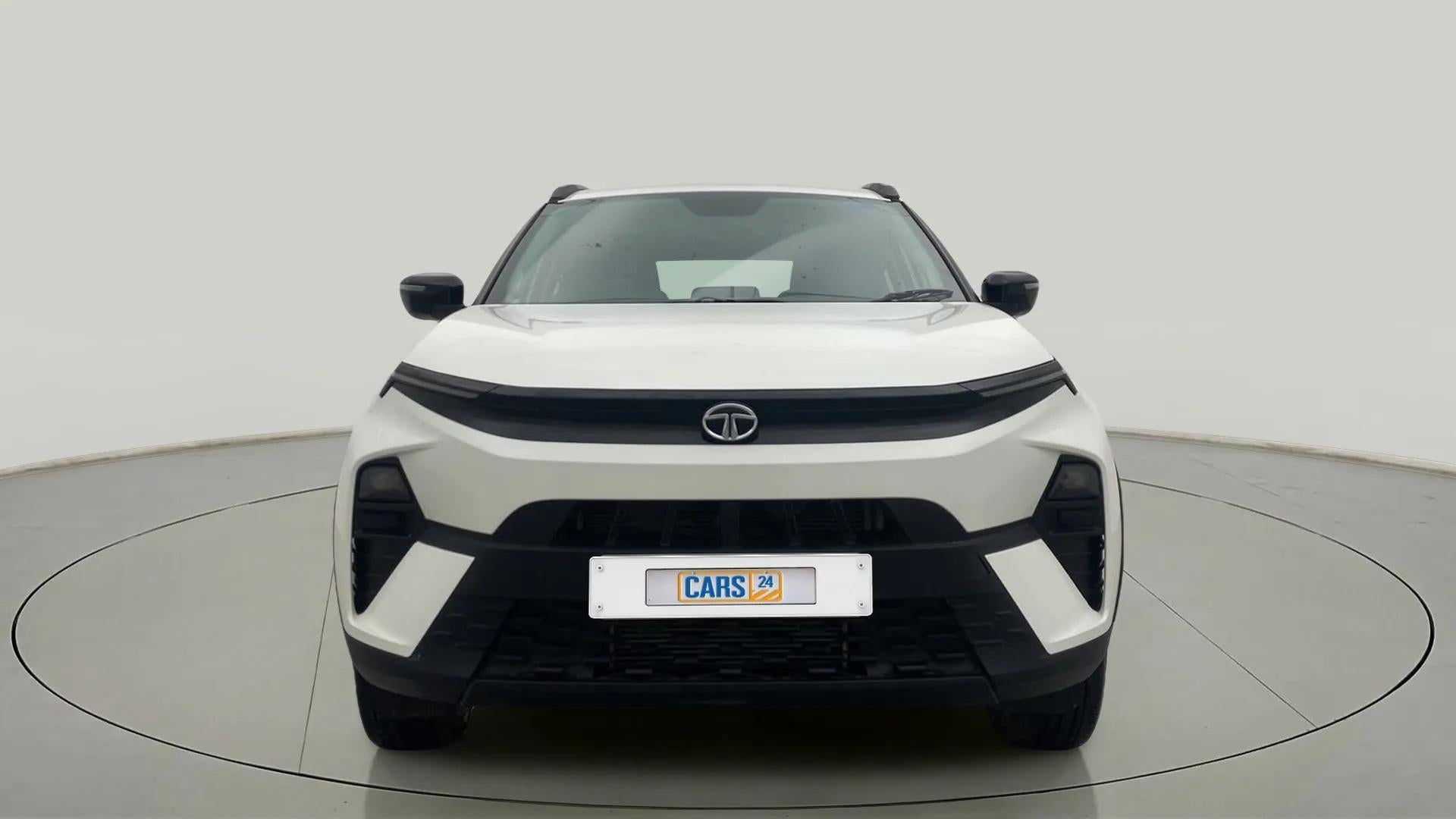 Front view of a Calgary White Tata Nexon 2017-2023