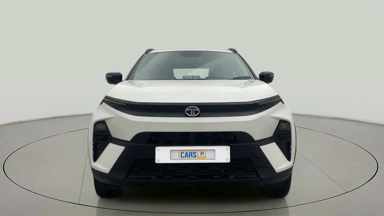 Front view of a Calgary White Tata Nexon 2017-2023