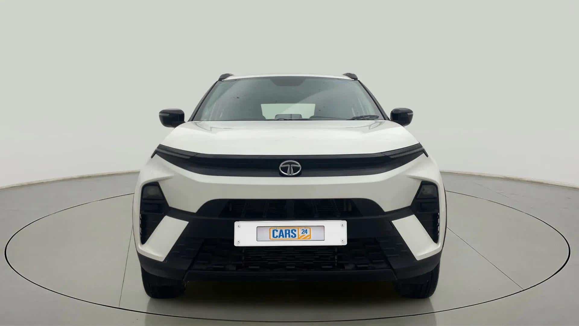 Front view of a Calgary White Tata Nexon 2017-2023