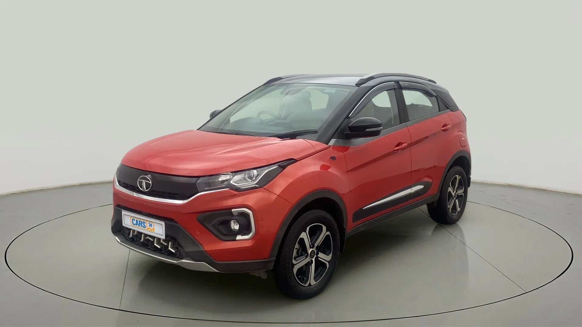 Front three-quarter view of a Flame Red Tata Nexon 2017-2023