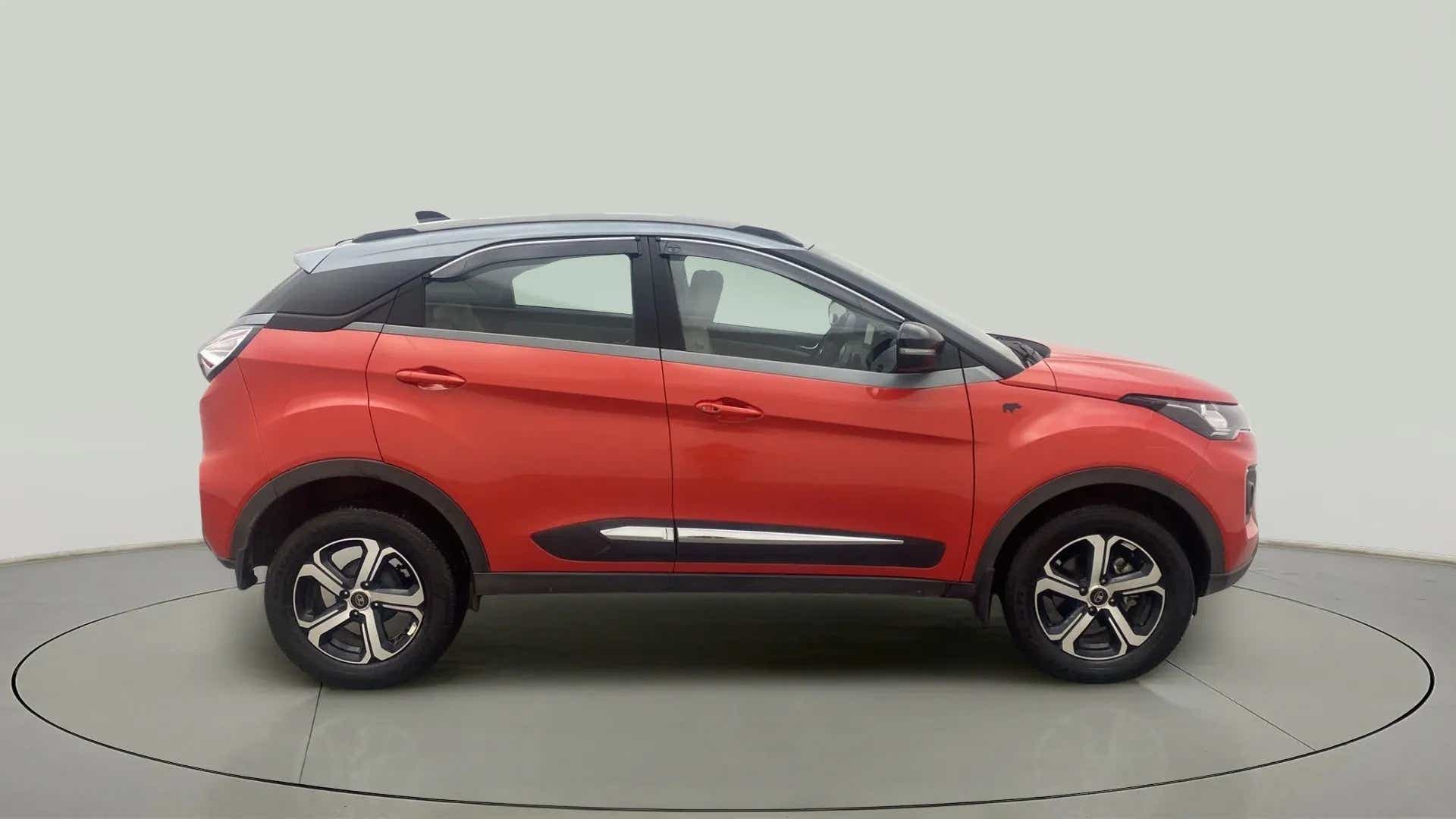 Side profile of a flame red tata nexon 2017-2023