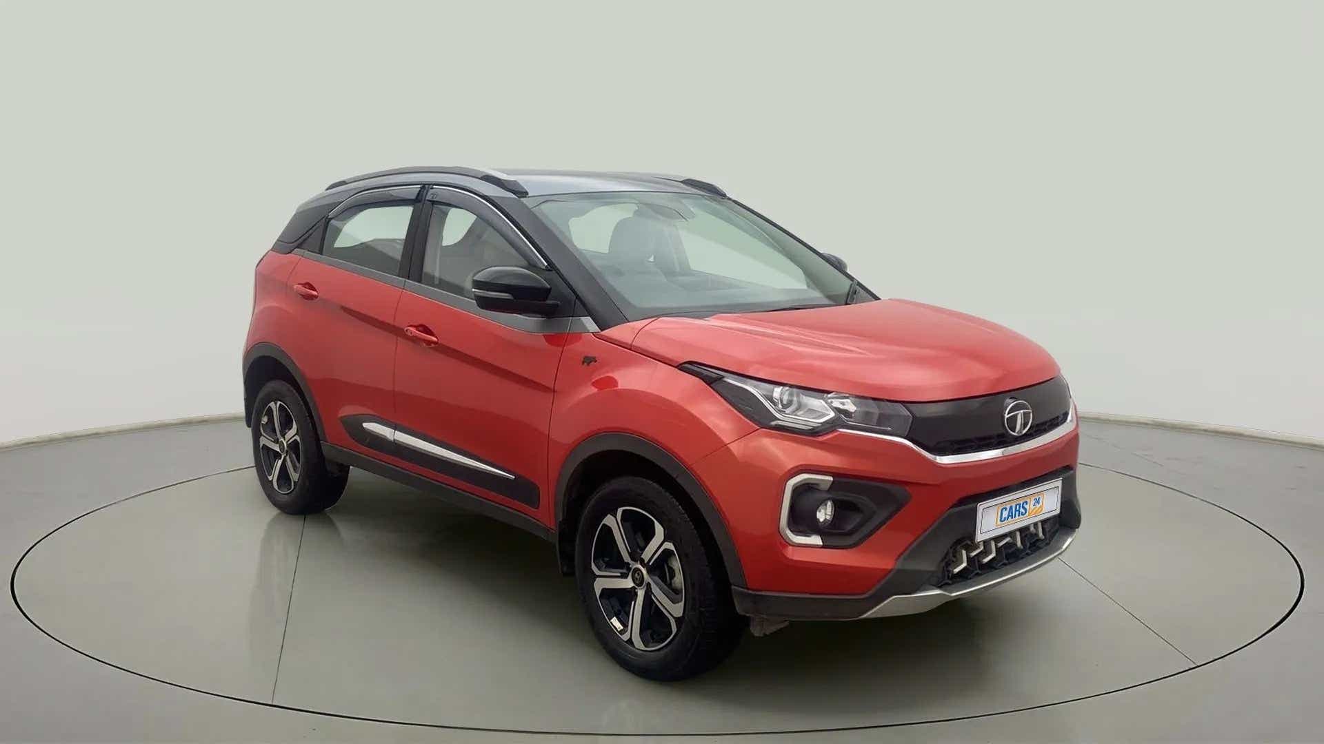 Front three-quarter of a flame red Tata Nexon 2017-2023