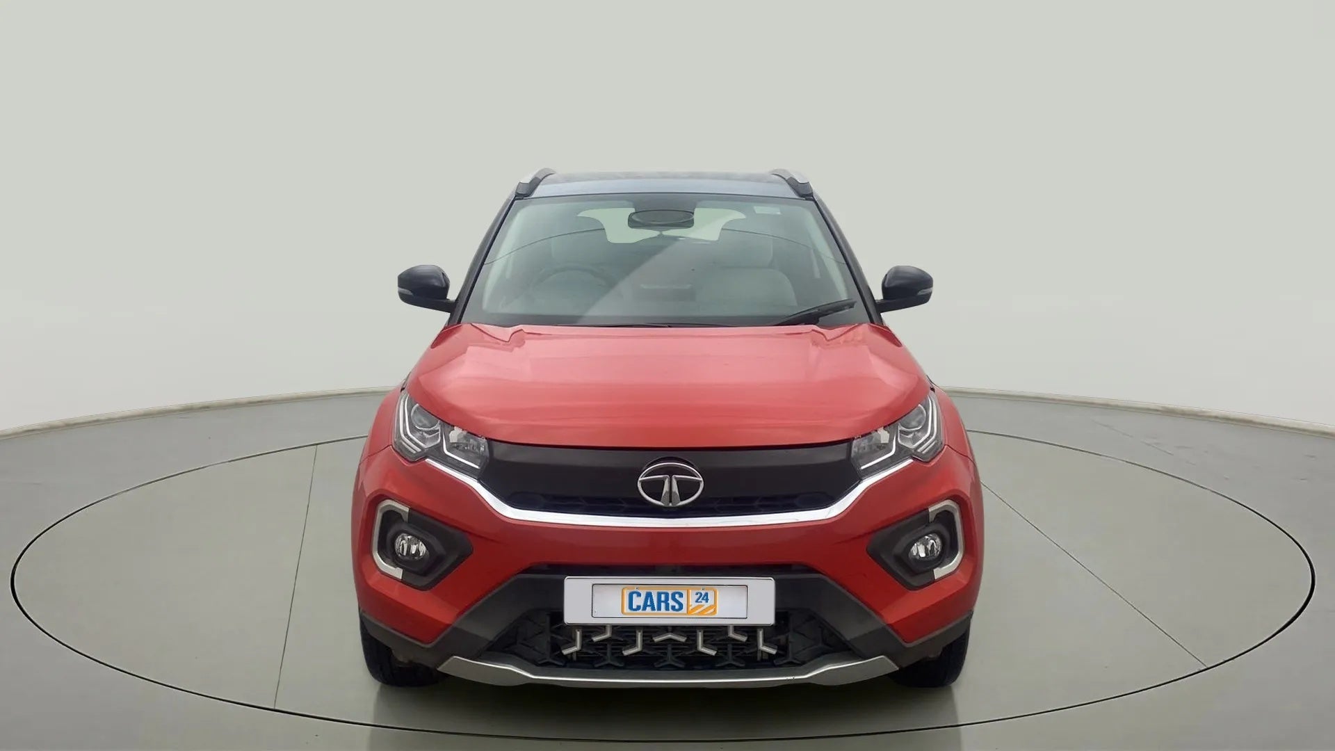 Front view of a Flame Red Tata Nexon 2017-2023