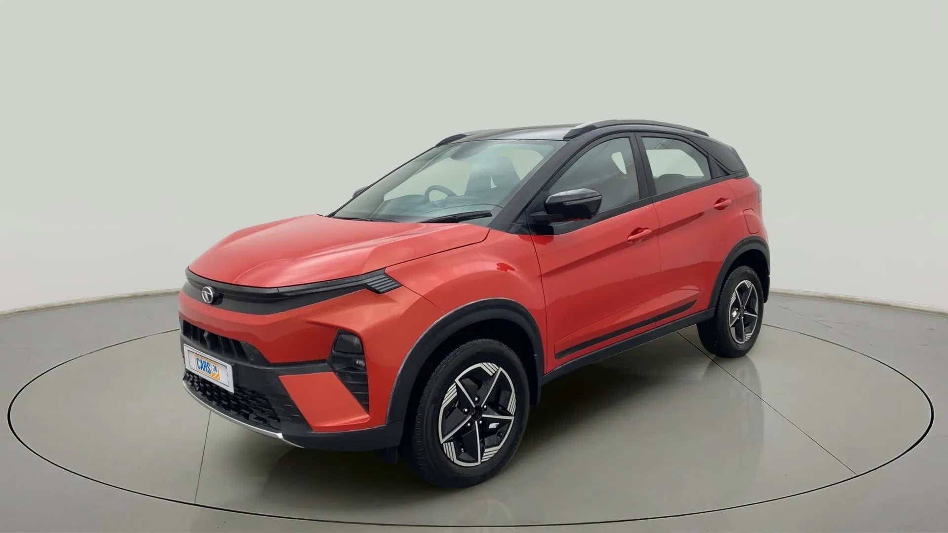 Front three-quarter view of a Flame Red Tata Nexon 2017-2023