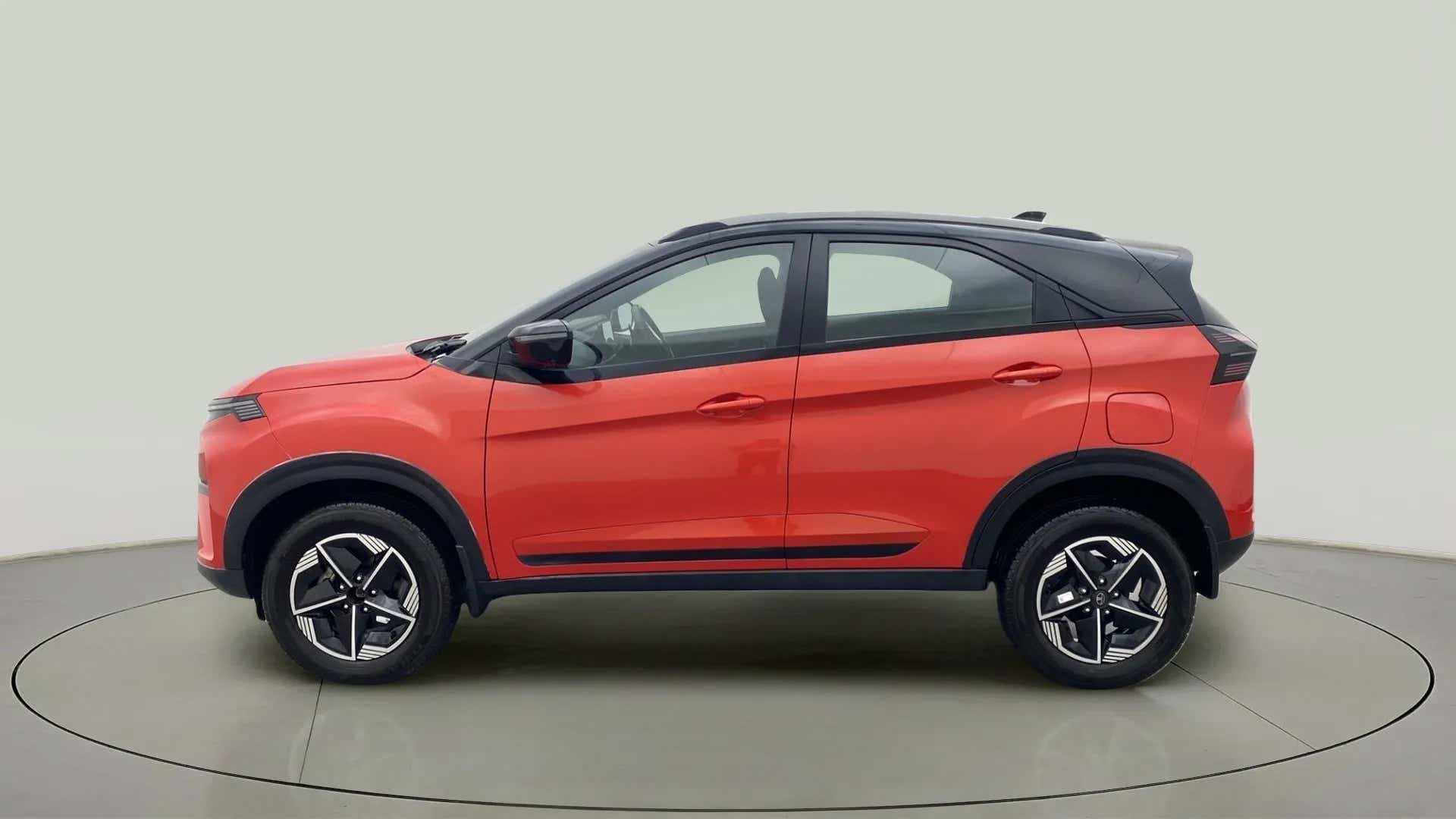 Side view of a Flame Red Tata Nexon 2017-2023