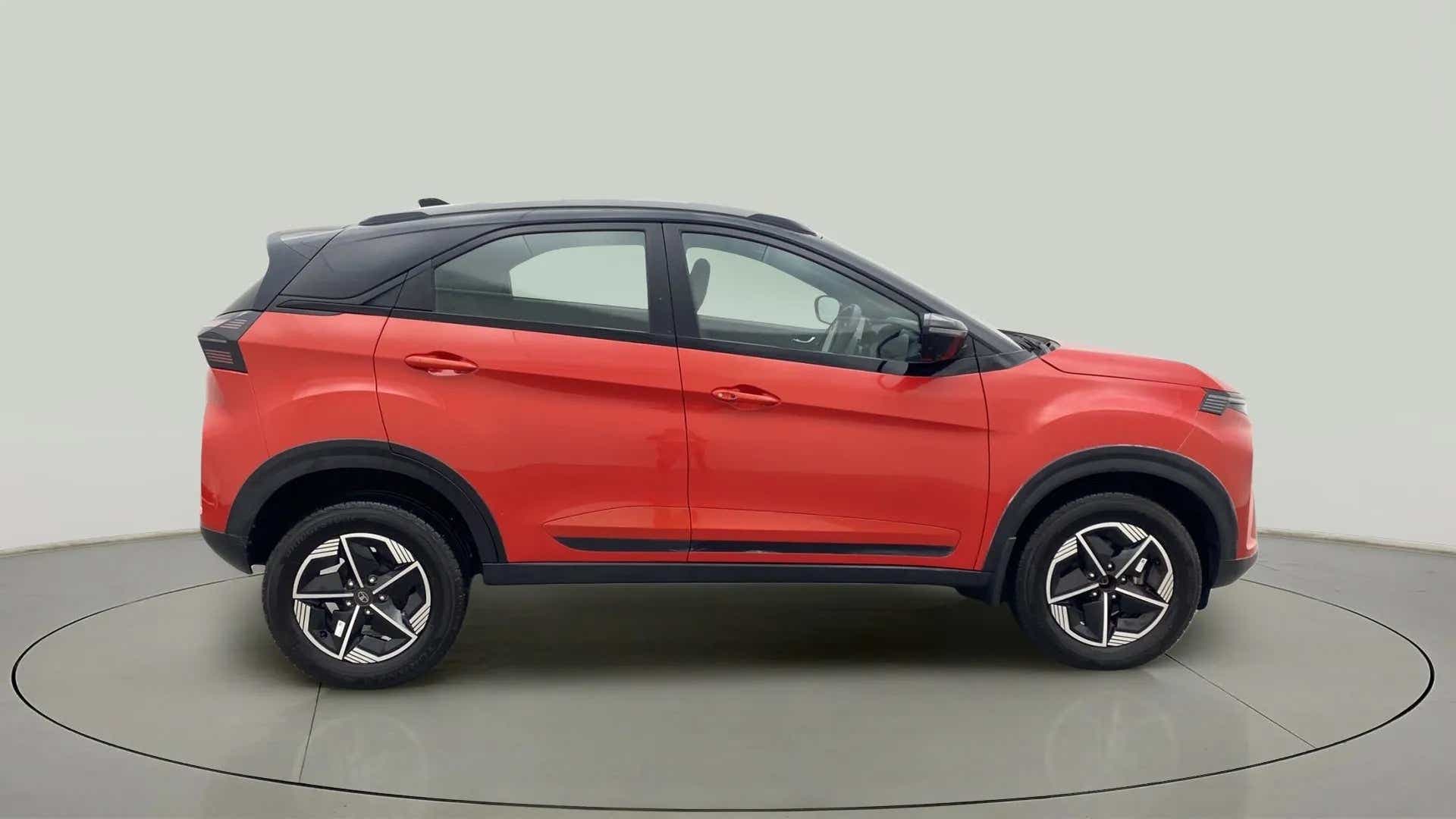 Side view of a Flame Red Tata Nexon 2017-2023